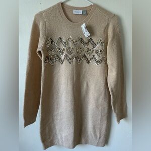 Cute and SOFT sweater dress with sequin heart design.